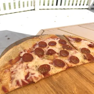 a slice of pepperoni pizza
