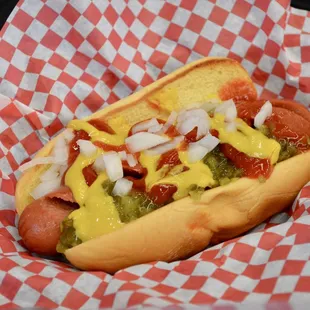 a hot dog in a basket