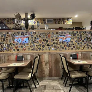 a wall of stickers on the wall