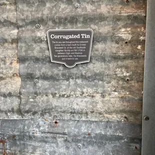 a plaque on the wall