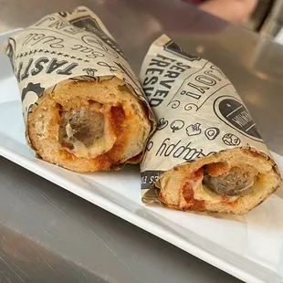 two burritos on a plate