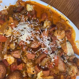 Shrimp and grits.  I advise the small size.  I couldn't finish even half of it after the appetizers.