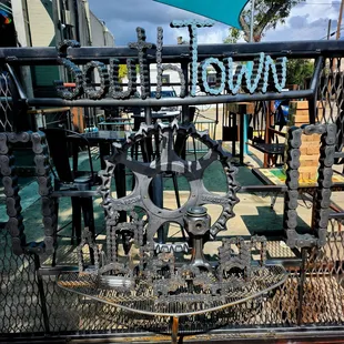 a metal gate with a sign that says southtown