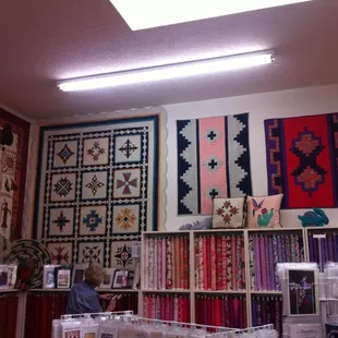 Examples of the quilt patterns and craft patterns they sell.