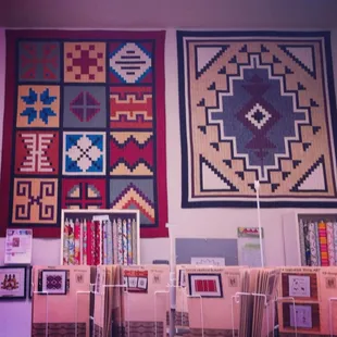 Examples of the quilt patterns and craft patterns they sell.