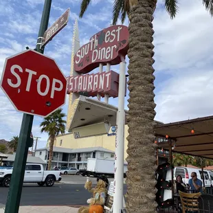 a stop sign and street signs