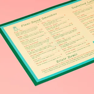 a menu on a pink background