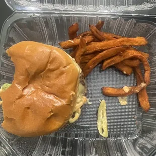 a sandwich and sweet potato fries