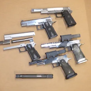 Race guns in various stages of build or repair. #swguntech