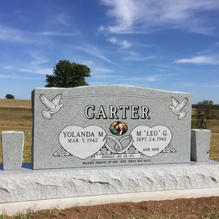 Companion Headstone, made from Georgia Gray Granite. Two Flower Vases. Frosted Outline Lettering Style for Family Name