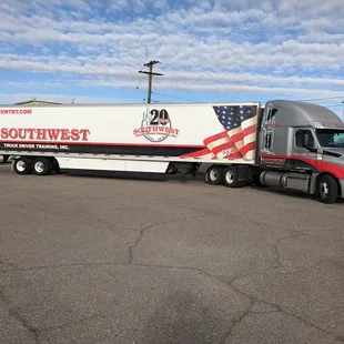 Good looking training tractor and trailer! We only train on the best equipment.