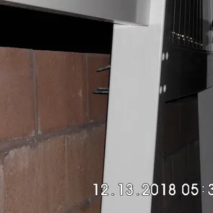 Wall came loose after strong wind.