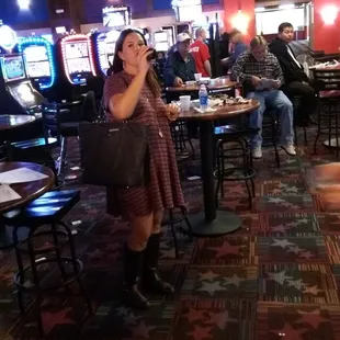 Tables have been parked out in front of the TV sets so people can eat and watch the races.