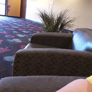 There is a pair of comfy chairs just behind the table section. I have taken refuge here until the last race.