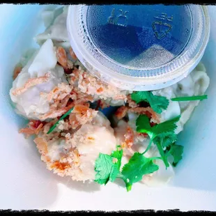 Wontons sold at the Clement Street Farmers Market on Sundays. I get mine with the potstickers sauce.