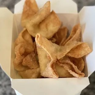 Crispy decent wontons but VERY skimpy on the filling...$9.99 price tag don't fit the filling!