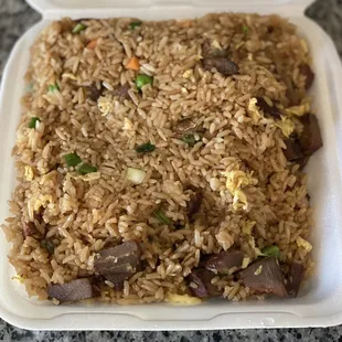 Pork fried rice that would feed 10 Lol! Was ok basic very basic could've used 1-2 min more in the wok