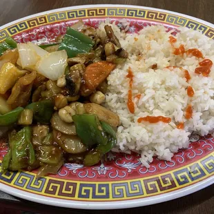 a plate of rice and vegetables
