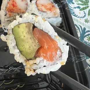 Stale sushi with old avocado