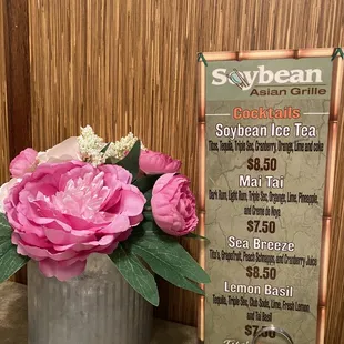 a menu and flowers