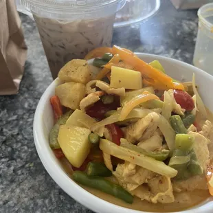 This is my first time here and I got the lunch special yellow curry with chicken and a Thai Iced Coffee