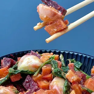 Soy sauce base house dressing with sweet potato, beets, mozzarella cheese and spinach. Allergy Info: Soybeans, Wheat Other Info: Ovo-VG