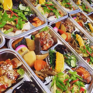 a variety of food in plastic containers