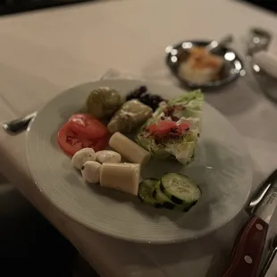Tastes from the salad bar including hearts of palm and wedge salad.