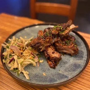 St. Louis Style Spare Ribs (1/2 rack) $11.00 soy-ginger bbq glaze, cabbage slaw