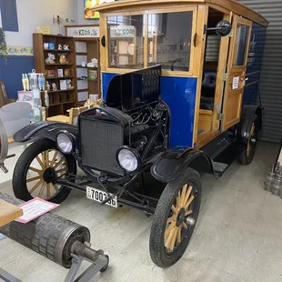 There is a car in the store! Neat!