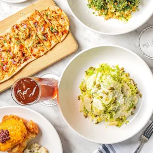 Our Carolina BBQ Flatbread, Kale Salad, Gold Coast Tuna Melt, and Green and White Salad, paired nicely with an Iced Tea.