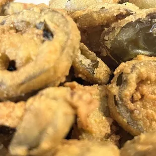 a pile of fried onion rings