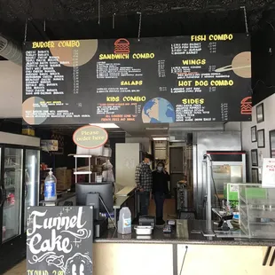 menus on the wall of the restaurant