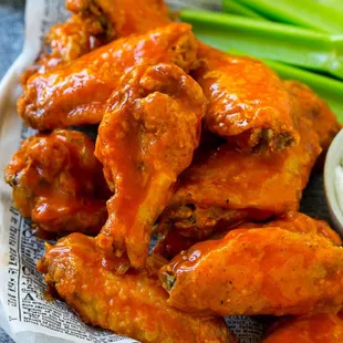 Indulge in our delicious and oven-baked wings, marinated with our homemade recipe. Tuesday wing specials