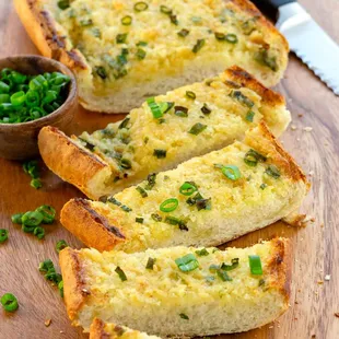 Indulge in the irresistible aroma and flavor of our warm garlic bread. Perfectly baked and served fresh, our garlic bread is the perfect com