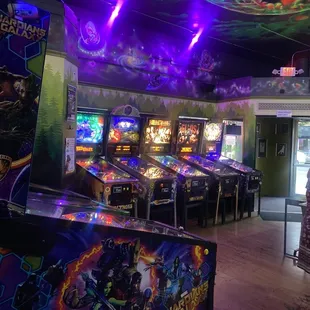 a row of pinball machines
