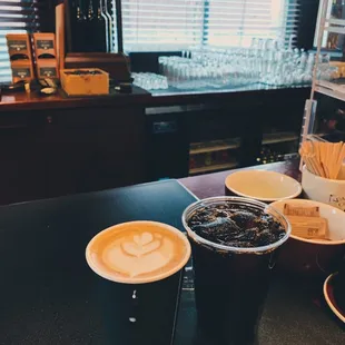 two cups of coffee on a counter