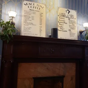 menus on a fireplace