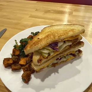Grilled cheese special of the week &quot;it&apos;s kind of a big dill&quot; shown vegan with sweet potatoes