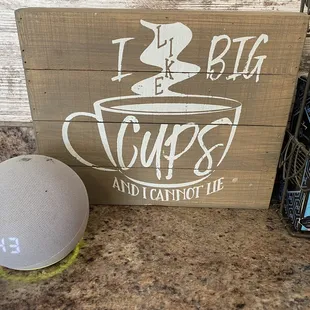 Alexia providing background music and a cute sign