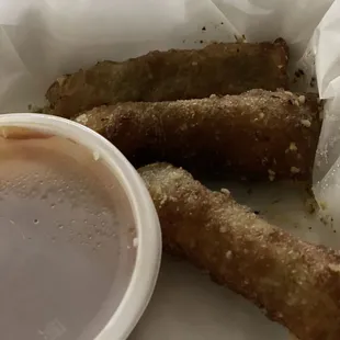 Pepperoni pizza rolls with marinara