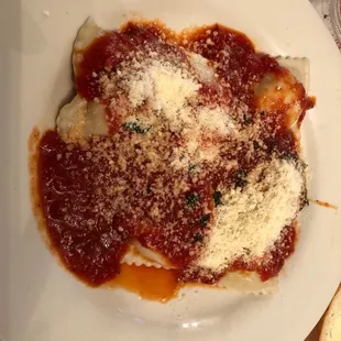 a plate of pasta and bread