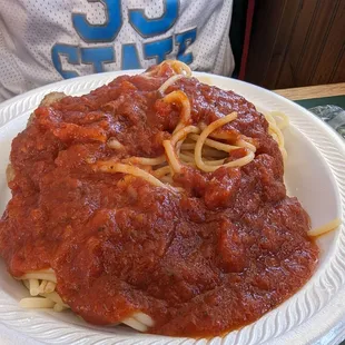 Spaghetti and meatballs are amazing! Get the garlic bread, too!