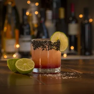 Tuscan Love Margarita: blanco tequila, fresh grapefruit &amp; lime juice, simple syrup, crème Yvette float- black salt rim &amp; lime
