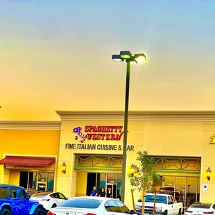 cars parked in front of a store