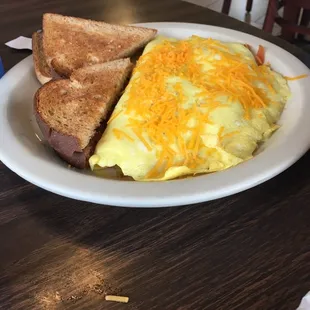 an omelet and toast on a plate