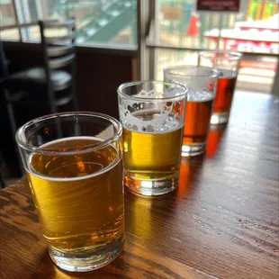 a row of glasses of beer