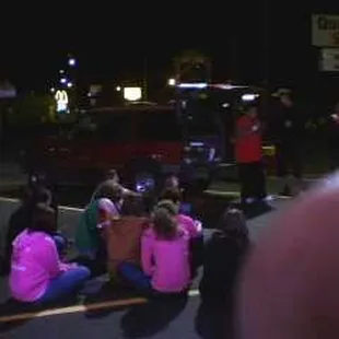 Grand opening.  Rapper singing in parking lot.