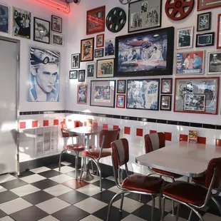 the interior of a diner with a checkered floor