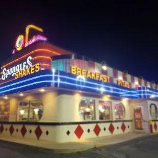 the exterior of a restaurant at night